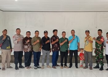 Sosialisasi Perda dan Tata Cara Pilkades 2025 Digelar di Gunung Sari, Bhabinkamtibmas Turut Hadir Beri Pengamanan
