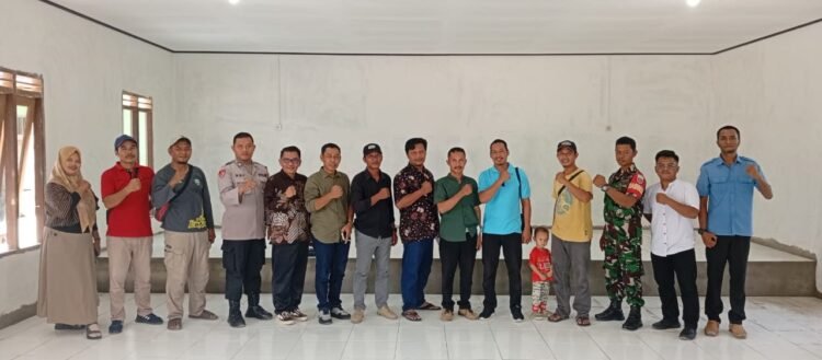 Sosialisasi Perda dan Tata Cara Pilkades 2025 Digelar di Gunung Sari, Bhabinkamtibmas Turut Hadir Beri Pengamanan