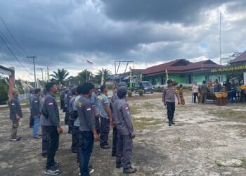 Penguatan Linmas Tanjung Palas Barat, Puluhan Anggota Dikukuhkan dan Dibekali Bimtek